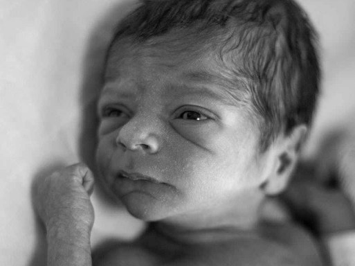 grayscale photo of newborn baby